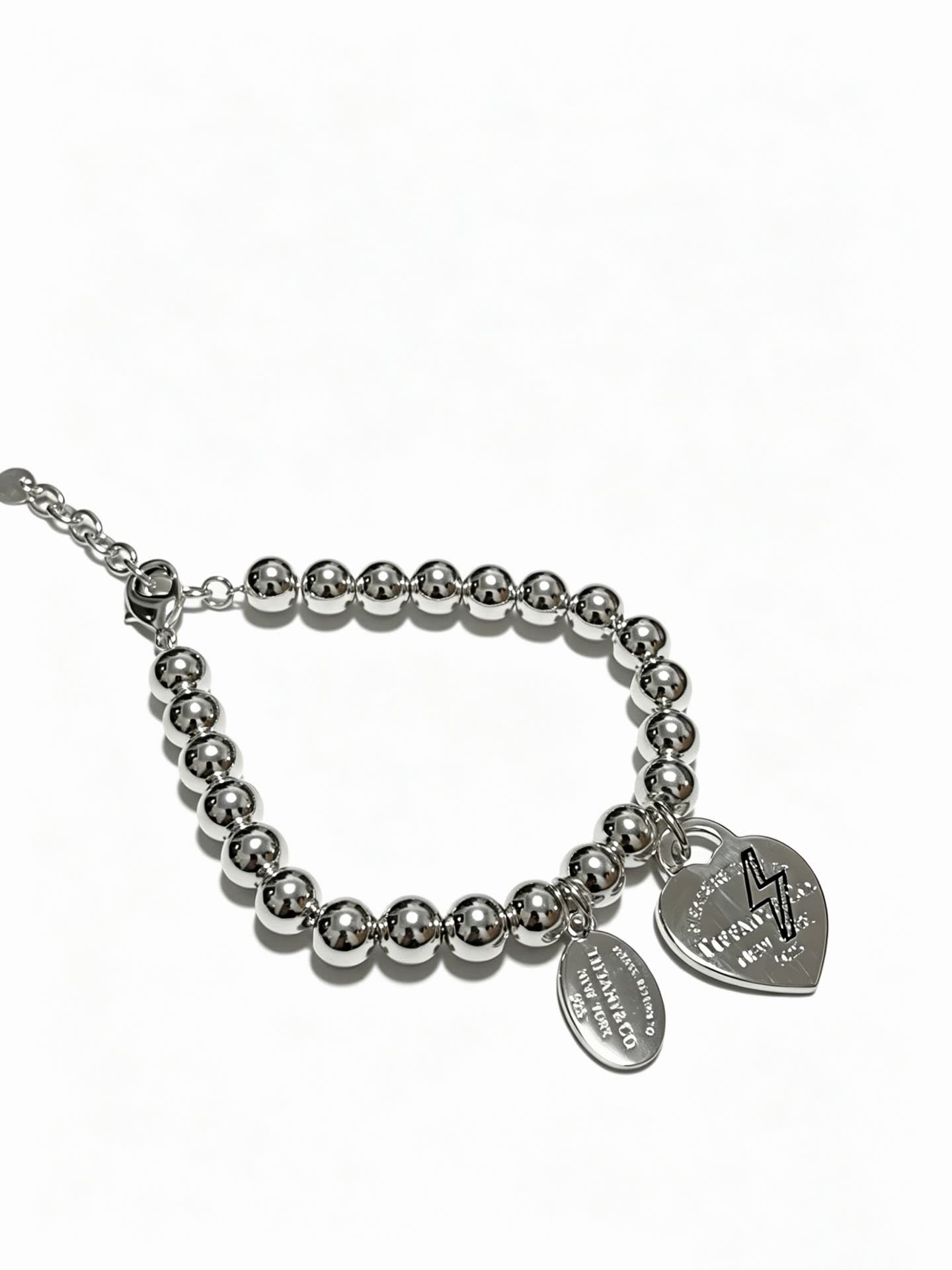 Tiffany & Co. Sterling Silver Bead Bracelet with Heart Tag